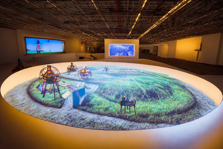 rural-revitalization-a-beautiful-home-an-oval-exhibition-hall-with-a-holographic-projector-in-the-.png